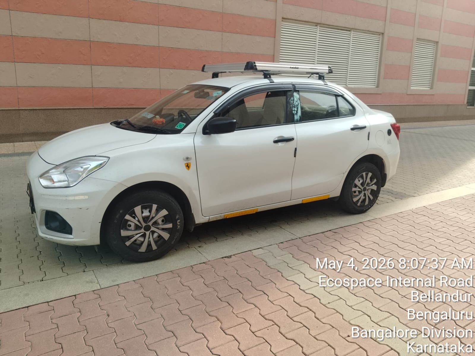 White Swift Dzire sedan outstation taxi for Bangalore to Chennai one way trip