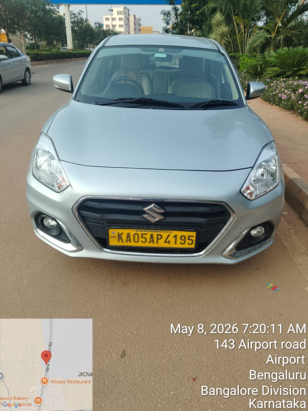 Swift Dzire sedan ready for interstate outstation cab service on NH48 highway